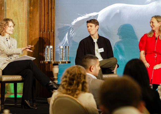 Conference panel discussion on stage