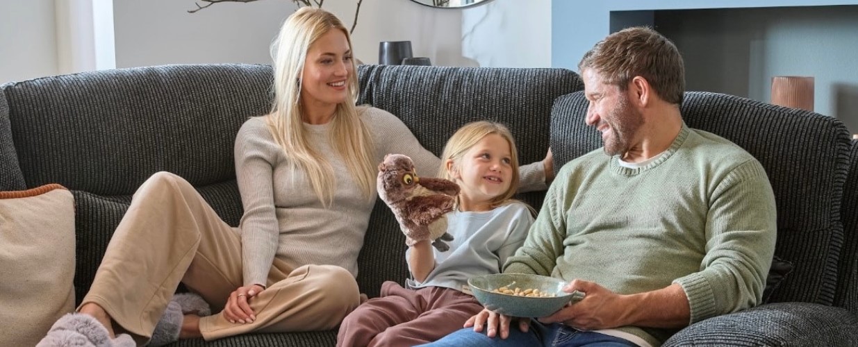 Family on DFS sofa