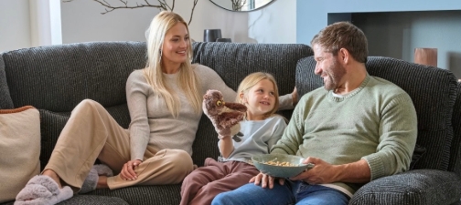 Family on DFS sofa