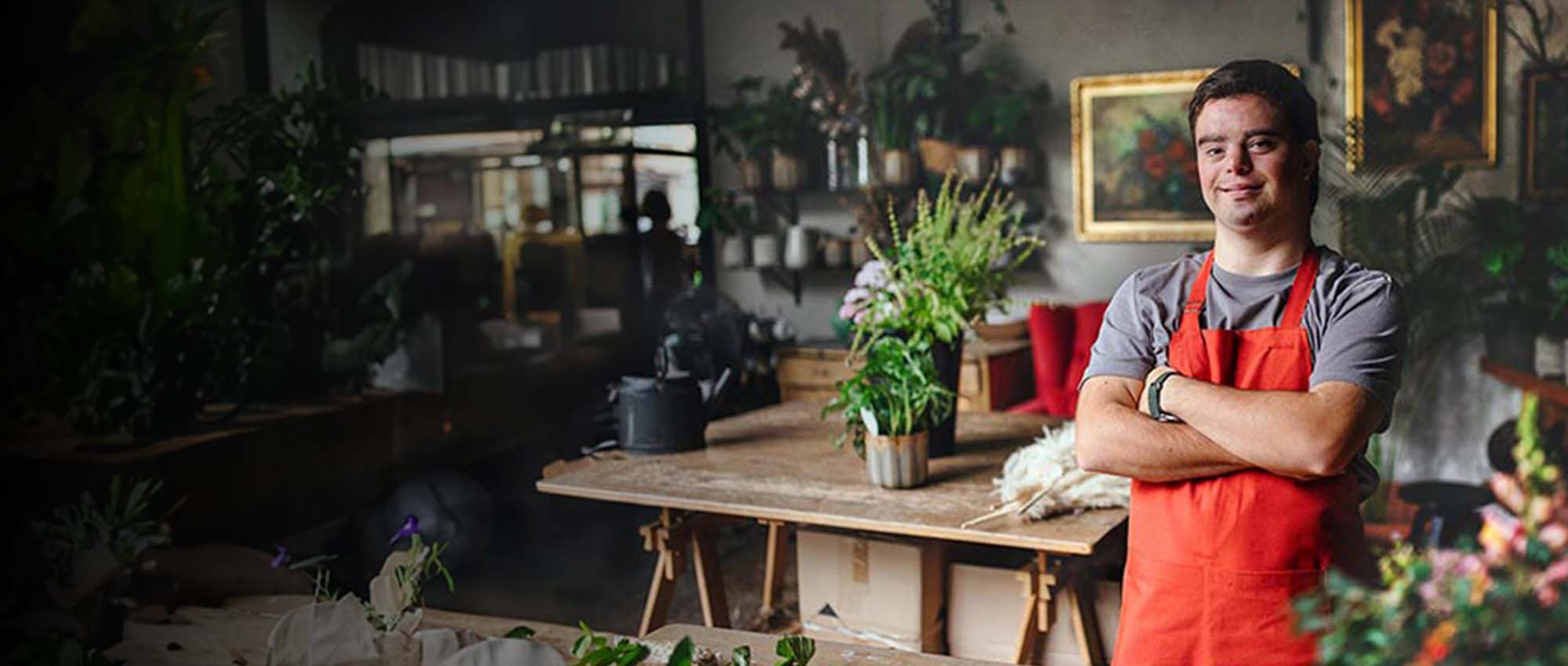 Florist stood in front of plants