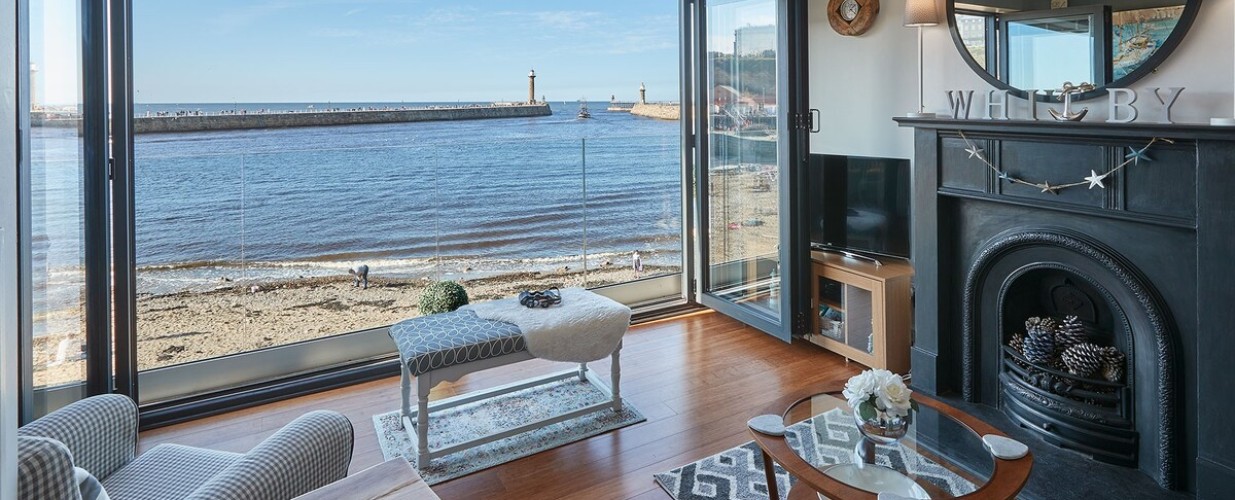 View of the sea through open bay doors