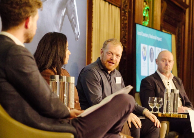 Panel speakers in discussion