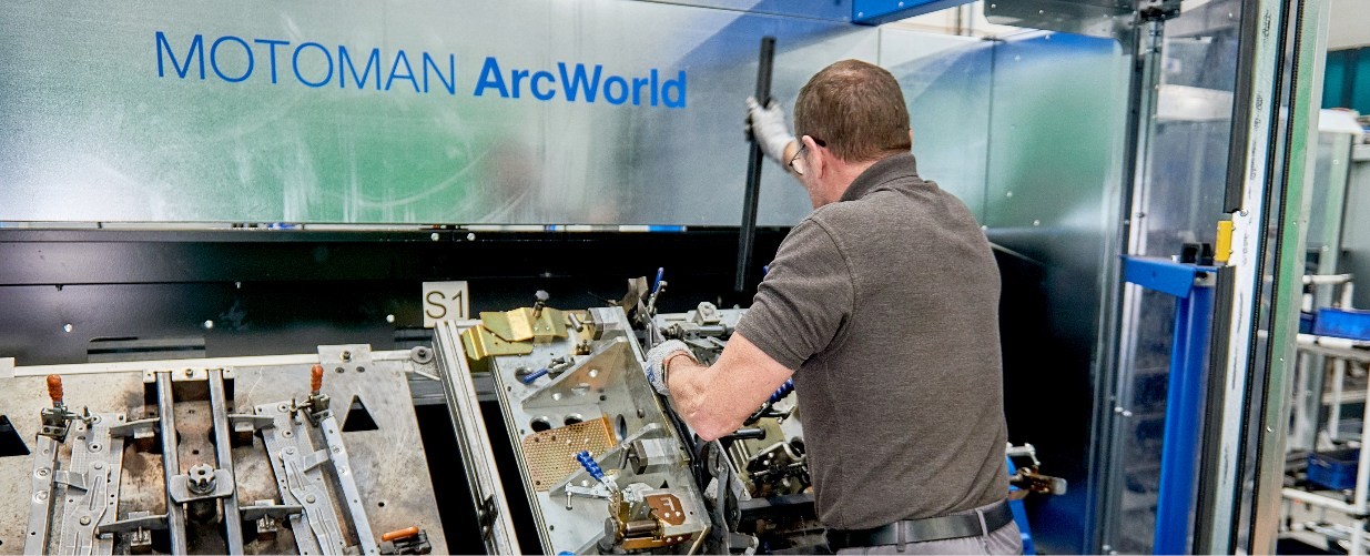 Man working on a conveyer belt