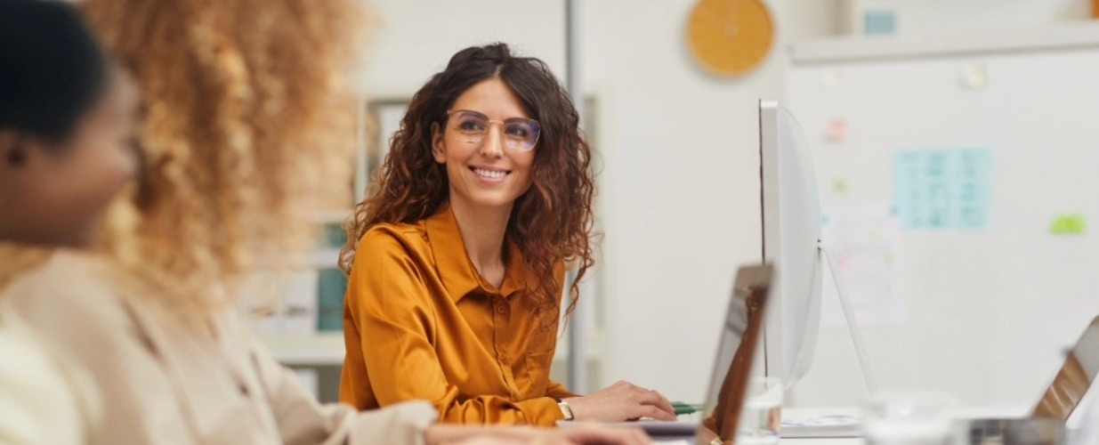 Two women on laptops