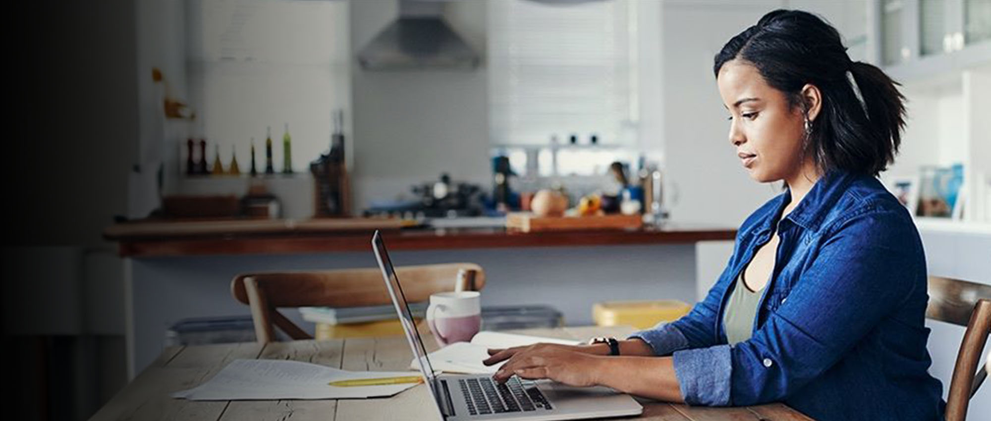 image of a woman working from home