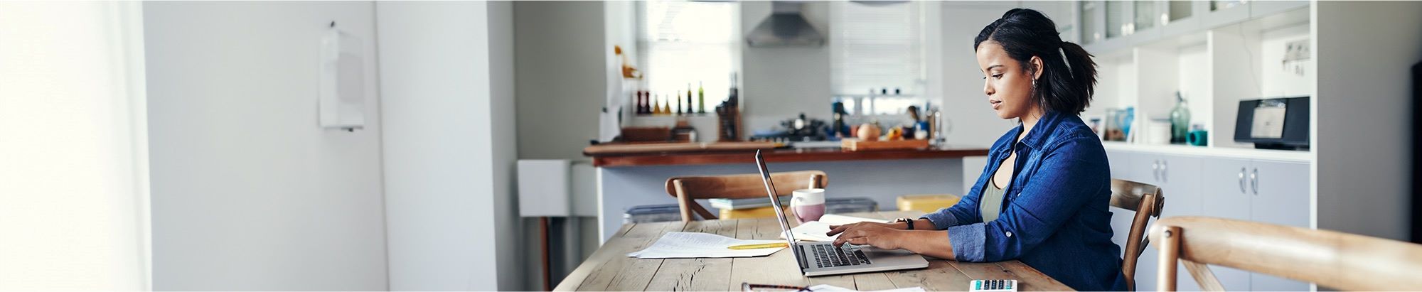 image of a woman working from home