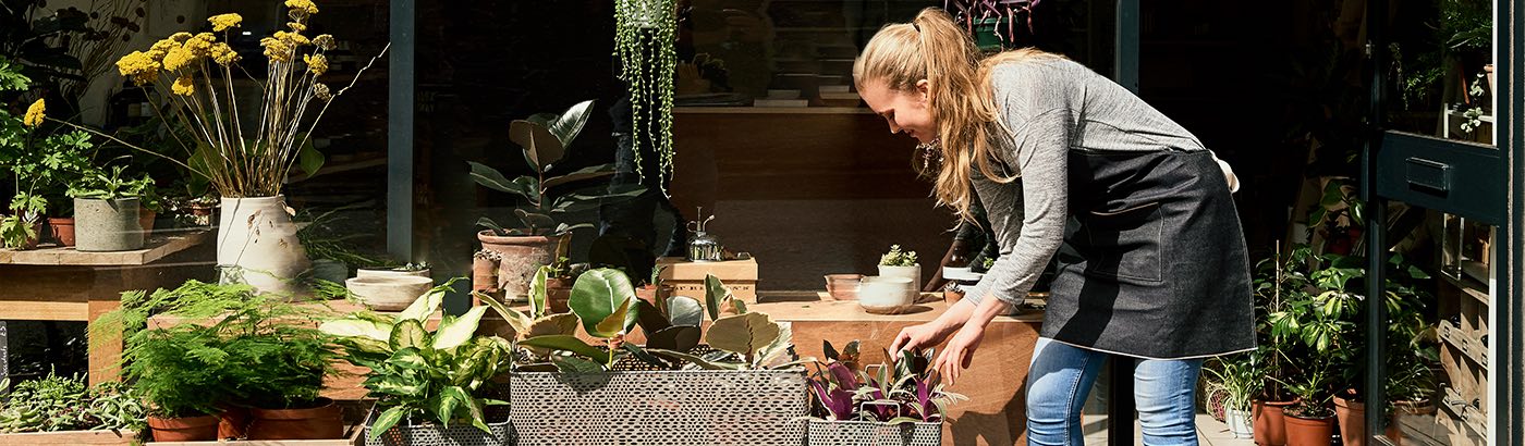 Woman working in flower shop