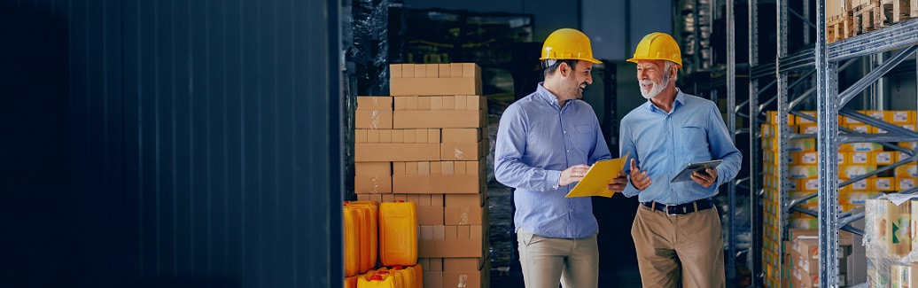 two men in yellow hardhats