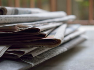 image of a stack of newspapers