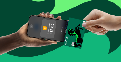 Peson making card payment using Tap to Pay.