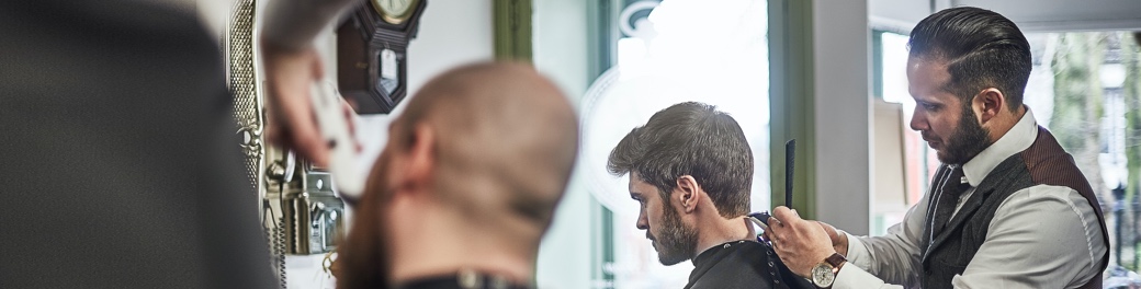Barber cutting hair