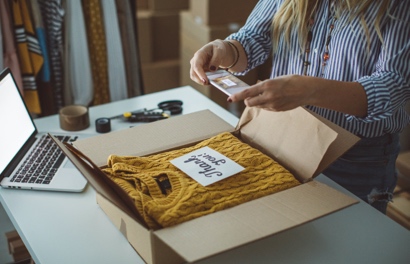 Business owner fulfilling online order.