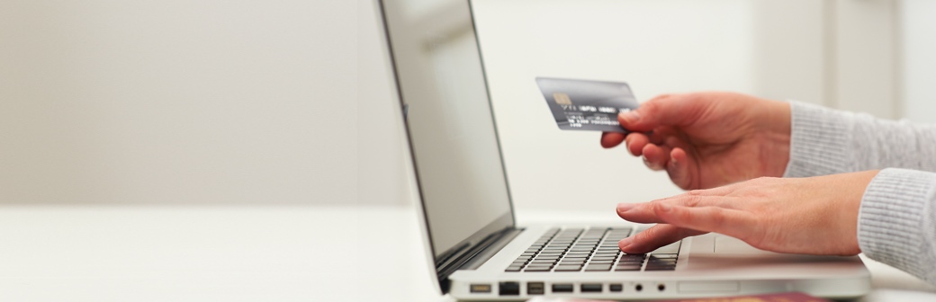 Customer making a payment online using a laptop

