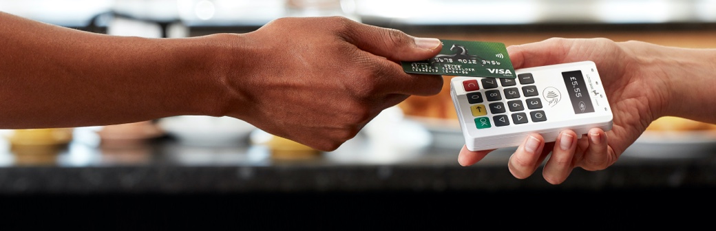 Small business accepting a card payment using a Lloyds Bank Cardnet® mPOS card reader