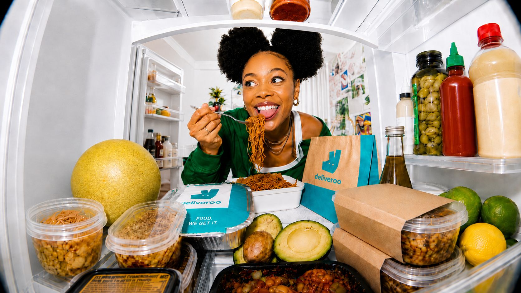 Student looking into fridge deliveroo