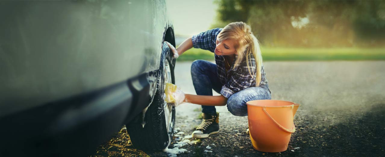 woman washing her car