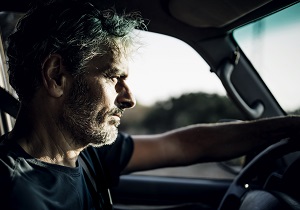 A man driving.