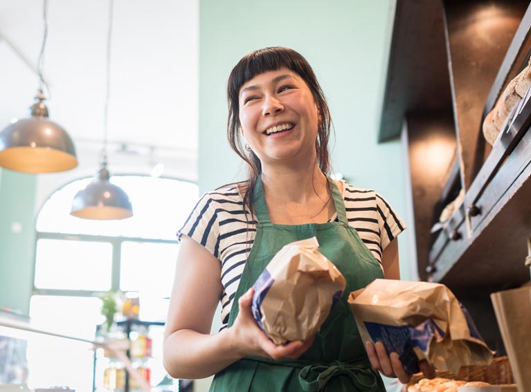 Woman in bakery.