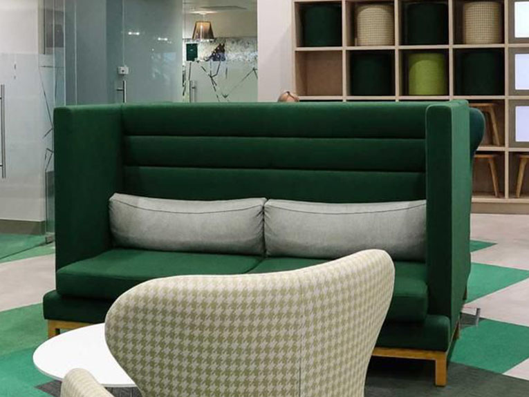 Lloyds branch with a green sofa