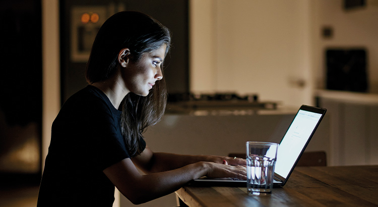 Lady typing on laptop