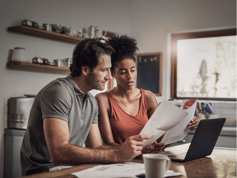 Couple looking through paperwork