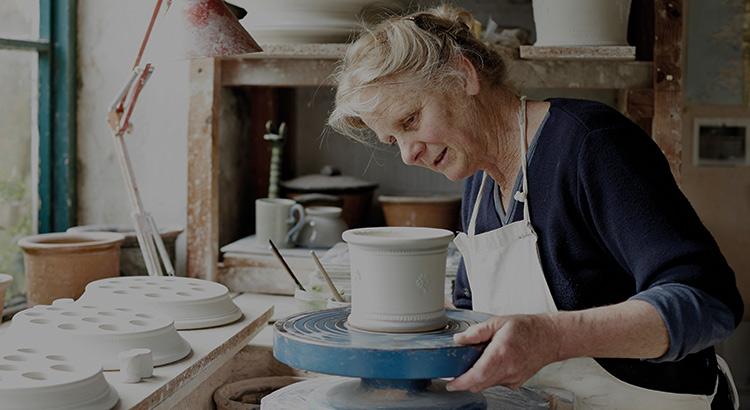 Woman doing pottery at home