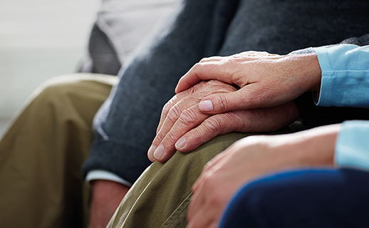 Couple holding hands