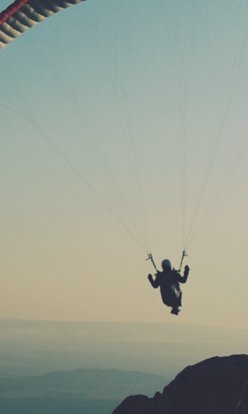 Horizon view of a kite surfer