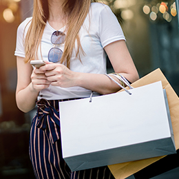 A woman carrying shopping bags