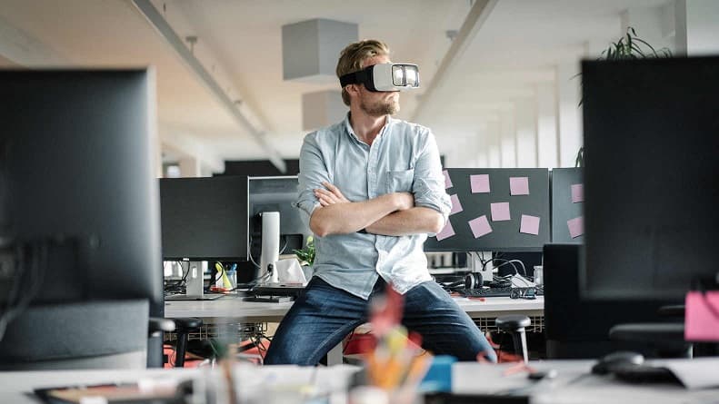 A man wearing a virtual reality headset
