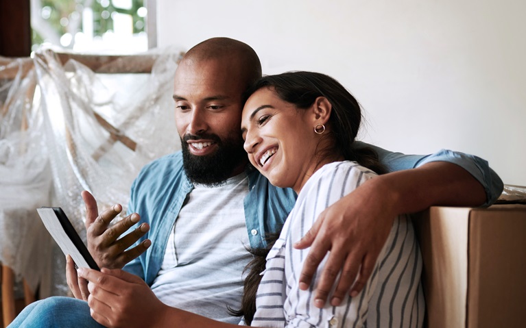 An image of a couple reviewing their finances.